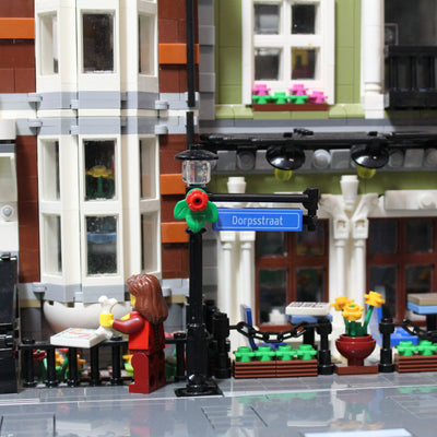 Straatnaambord 1x4 met Zwarte Lantaarnpaal Bord aan Zijkant