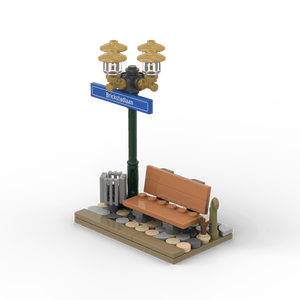 Grüner Laternenpfahl mit Bank - Blaues Schild