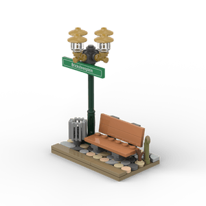 Grüner Laternenpfahl mit Bank - Grünes Schild